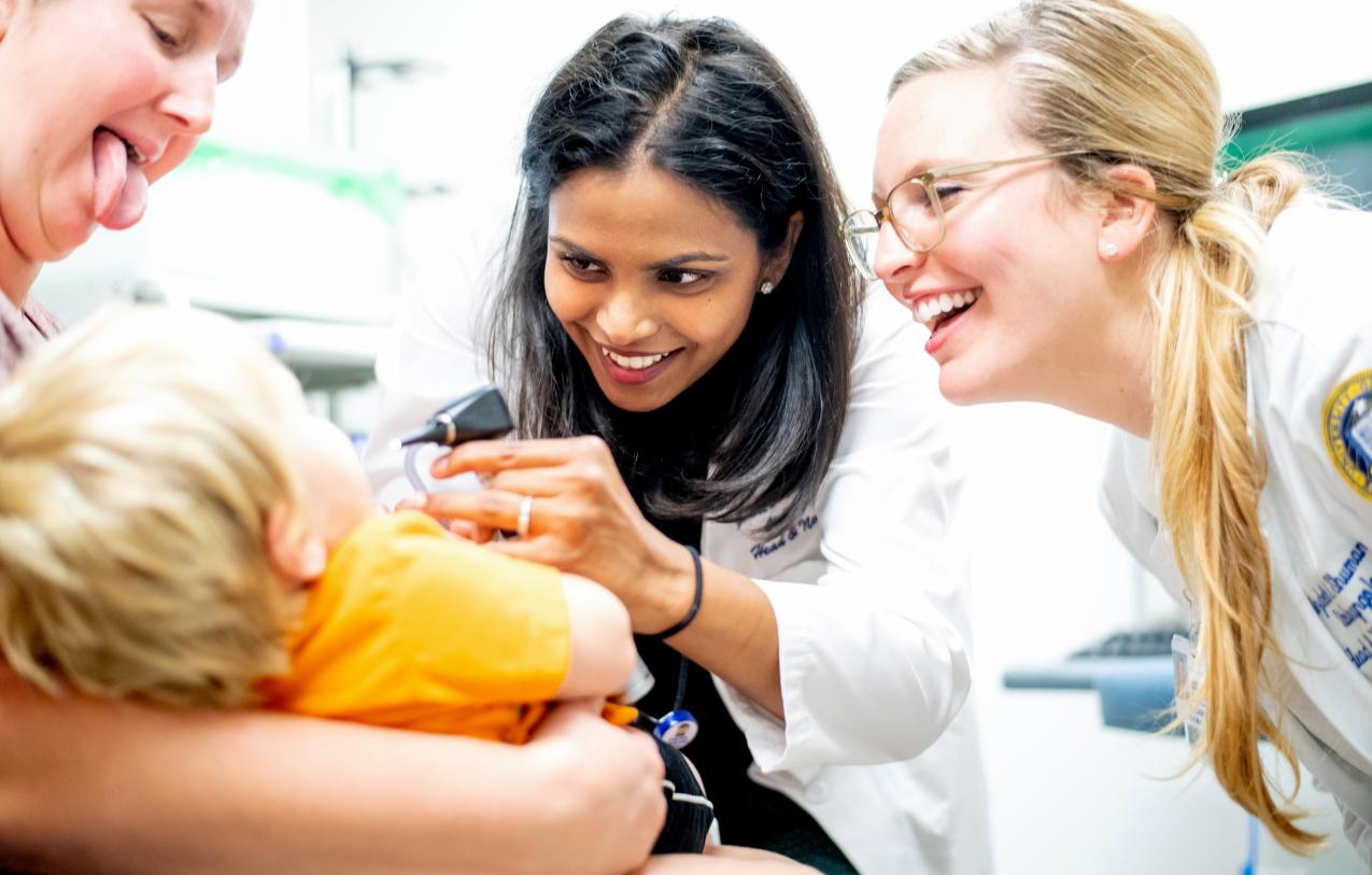 Doctors examine child