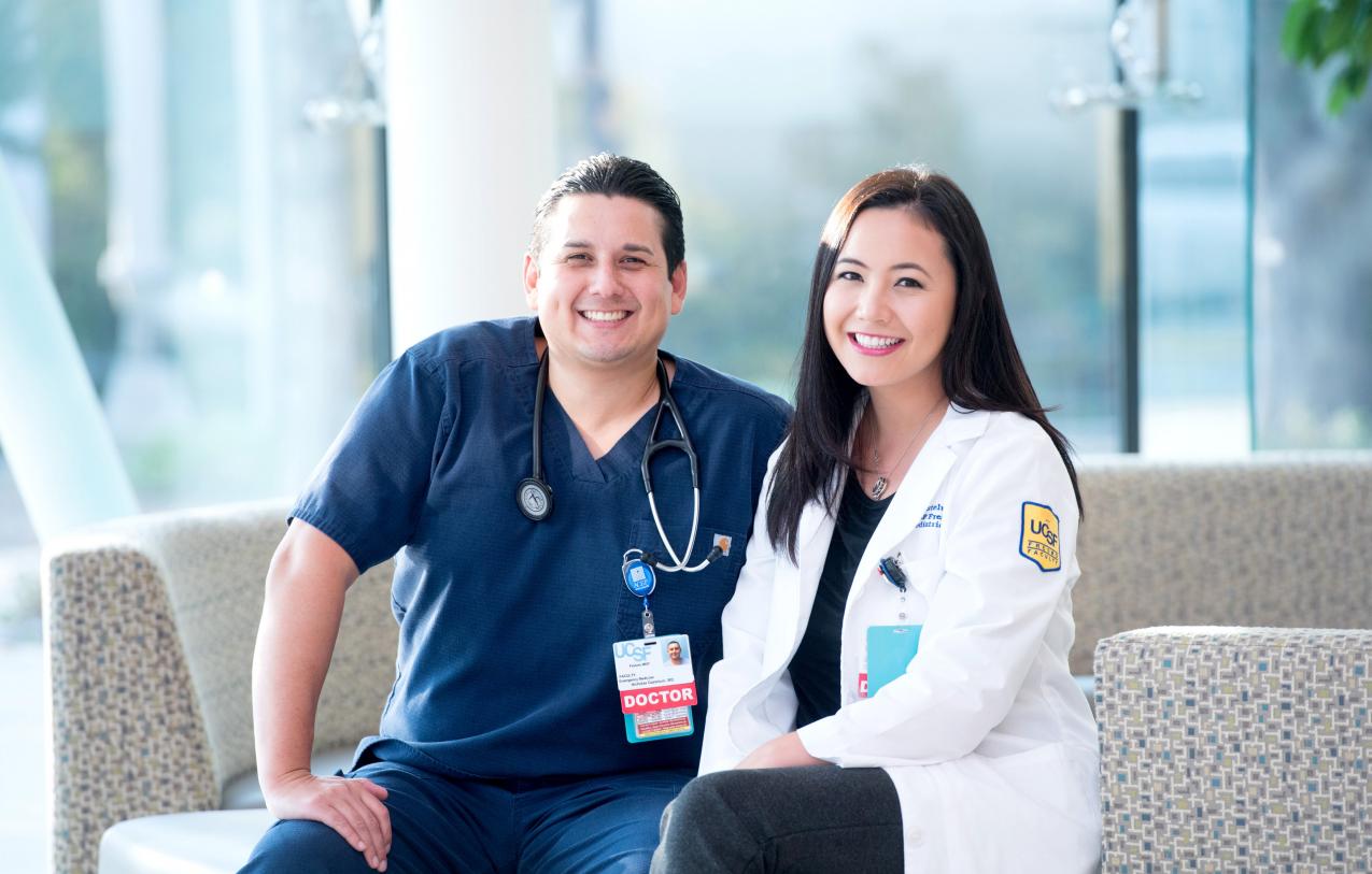 Doctor and fellow sit on a couch