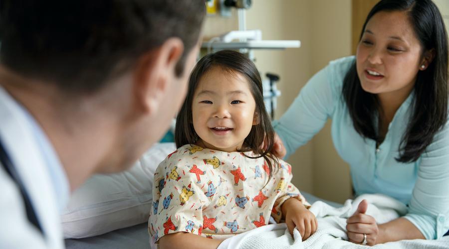 Child smiling at doctor