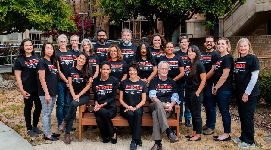 Members of the UCSF Sickle Cell Center of Excellence in a group photo wearing matching shirts with the phrase "Strong."
