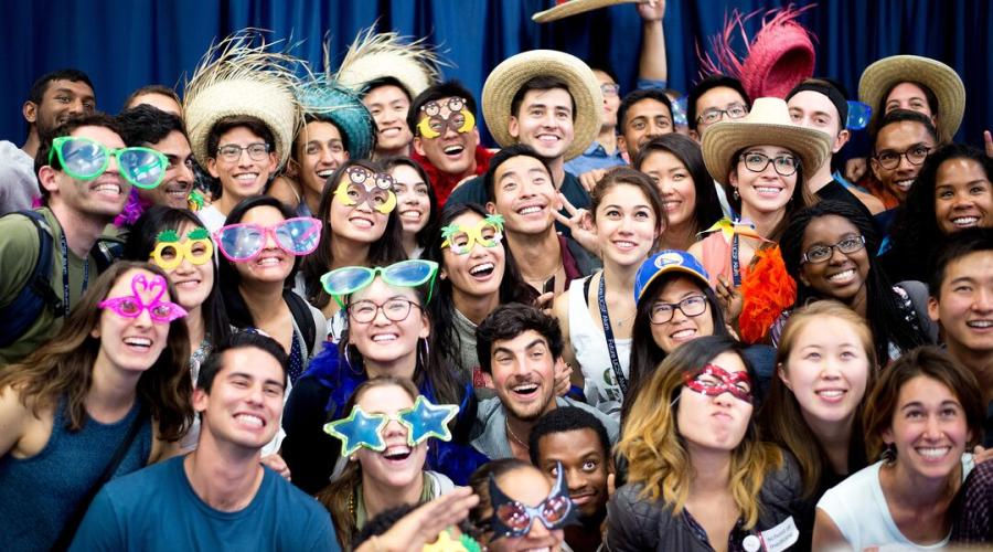 First-year students gather for photos during a reception at Millberry gym on UCSF's Parnassus campus