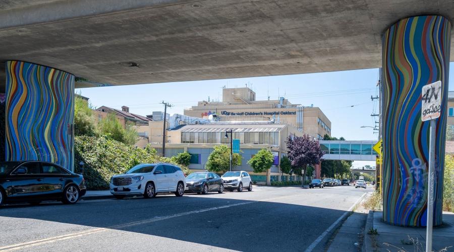 Artist Alan Leon covered the stark freeway and support columns with colorful murals under the Highway 24 overpass off of 52nd street, at the entrance to the Temescal neighborhood, adjacent to UCSF Benioff Children’s Hospital Oakland.