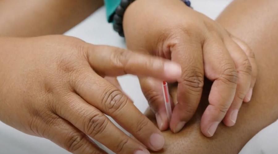 A nurse provides a caring hand