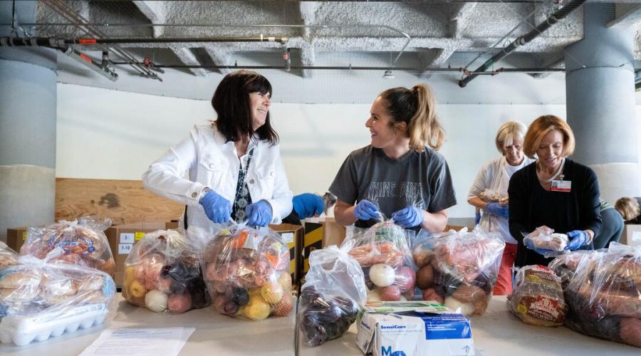 Volunteers at the UCSF Benioff Children’s Hospital Oakland Food Farm program that offers healthy groceries to patients and their families.
