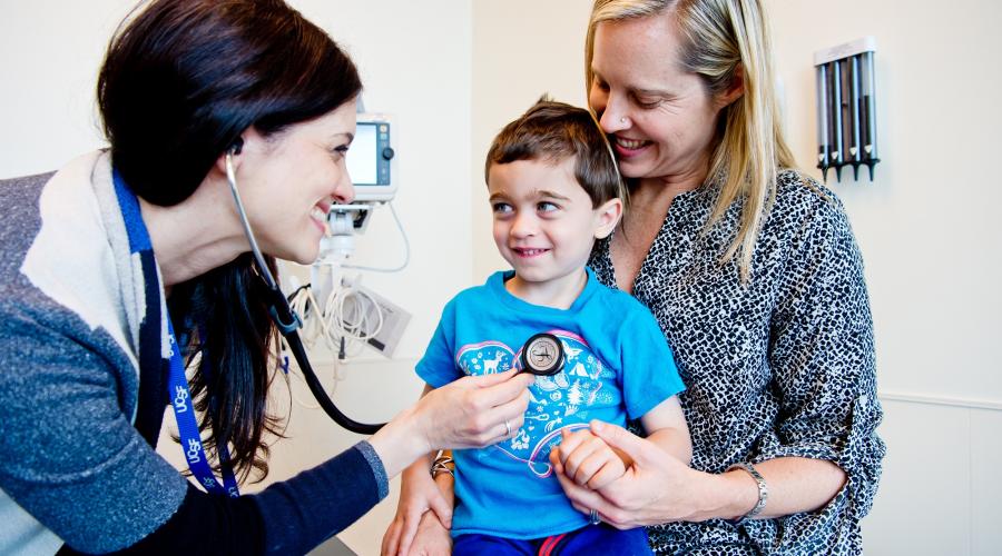 Shabnam Peyvandi, MD, MAS, (left), cares for a young patient at UCSF Benioff Children's Hospital San Francisco. 