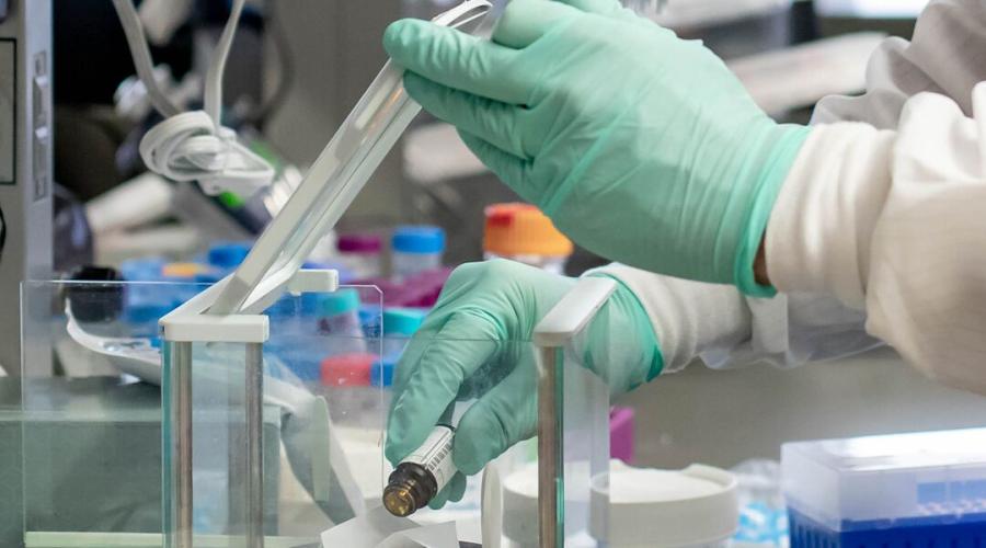A cancer researcher works in the UCSF Helen Diller Family Comprehensive Cancer Center, at the Mission Bay campus