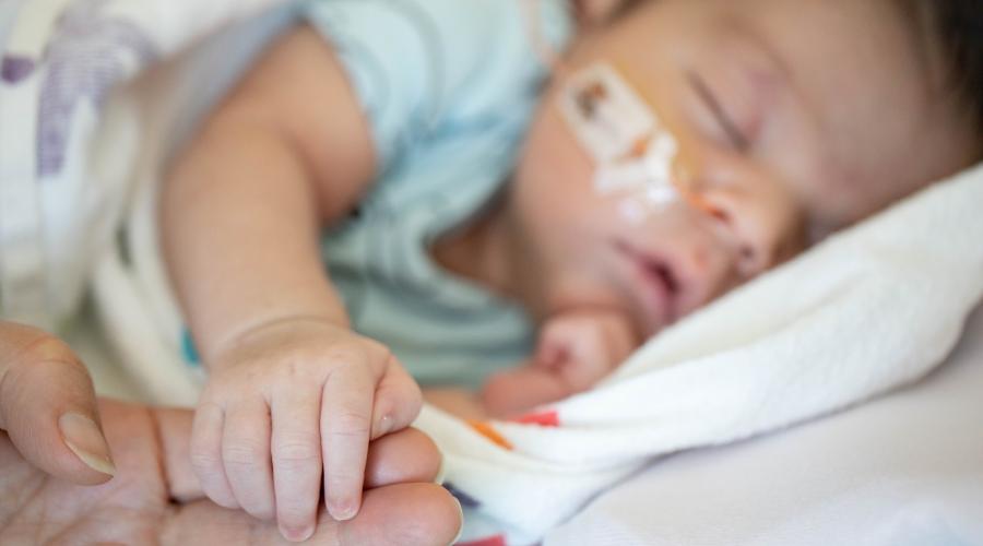 A 15-day-old infant in the Pediatric Intensive Care Nursery, at Benioff Children’s Hospital, at the Mission Bay campus. Photo by Susan Merrell