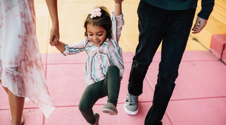 A child plays in a playground. 